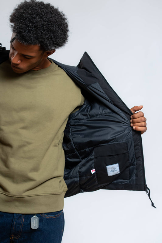 Dettaglio del taschino interno del giubbino cp company pro tek medio nero