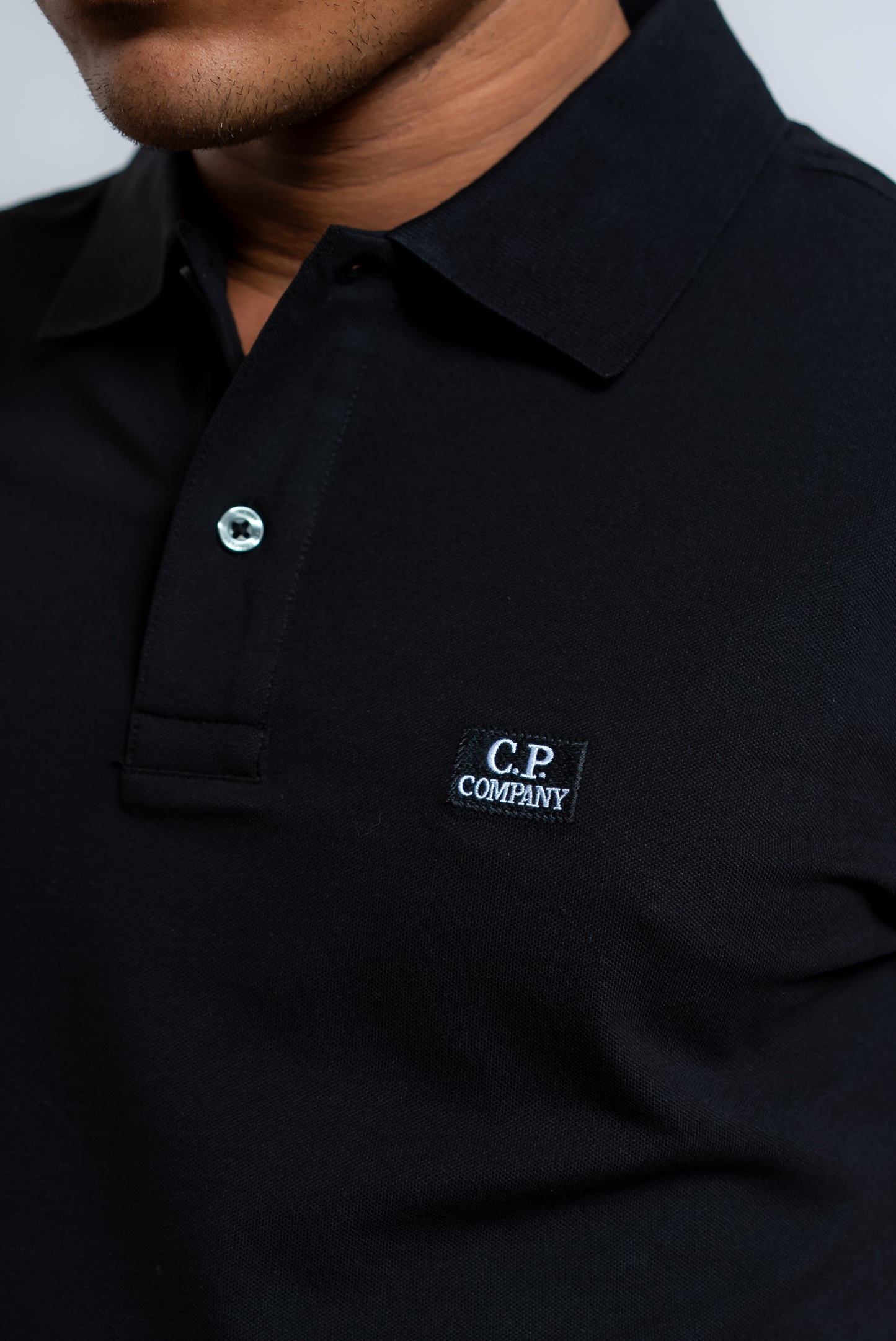 Polo Nera Con Logo in Cotone Stretch