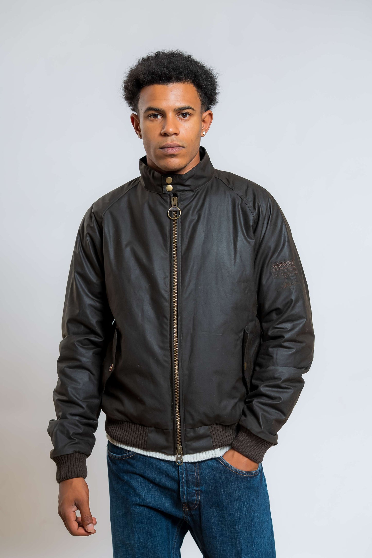 barbour international uomo giubbino merchant waxed verde in cotone cerato - visuale frontale 